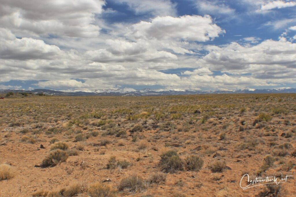 Open high-desert scrubland with distant snowy Sangre de Cristo mountains on the horizon, Blanca CO APN 70302130