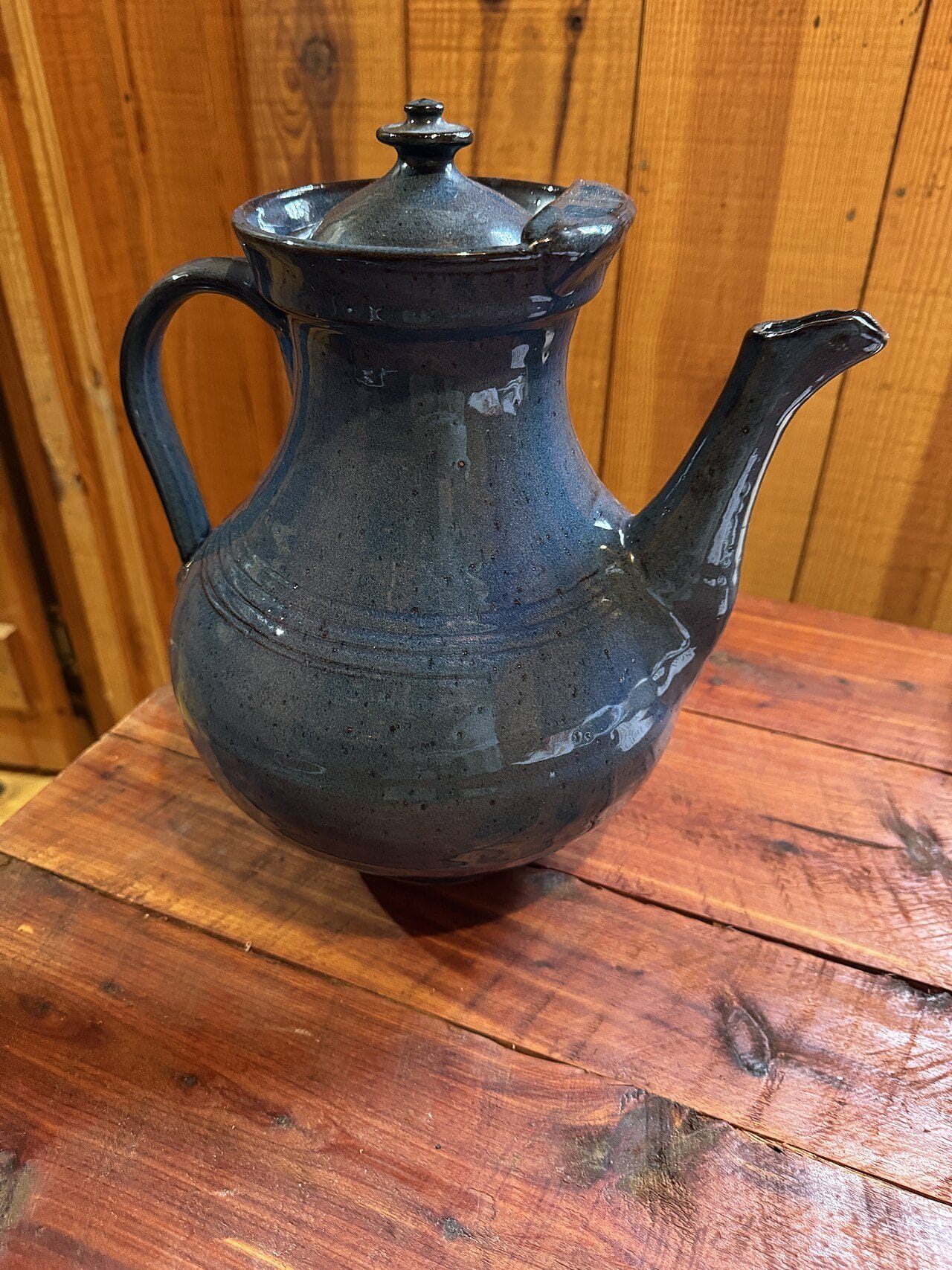 A glazed stoneware teapot thrown by an M.L. Owens potter in Seagrove, North Carolina