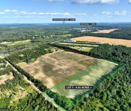 9.45-acre lot for sale in Necedah, Juneau County, Wisconsin — aerial view with the parcel boundary and acreage marked