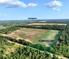 9.45-acre lot for sale in Necedah, Juneau County, Wisconsin — aerial view with the parcel boundary and acreage marked