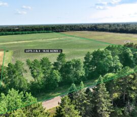 18.92-acre double lot for sale in Necedah, Juneau County, Wisconsin — aerial view with the parcel boundary and acreage marked