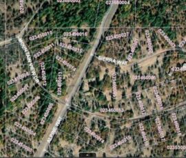 GIS aerial wider view showing the subdivision neighborhood and surrounding timber land, parcel 023-460-028-000, Shasta County, CA