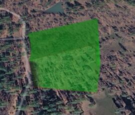 Google Earth 3D perspective view of parcel 023-460-028-000 and surrounding forested neighborhood, Sierra Way, Fall River Mills, CA
