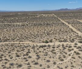 Aerial overview showing the lot boundary and surrounding desert landscape, Yucca AZ — APN 245-21-102
