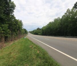 Ground-level view of NC 14 along the property edge with power poles visible, Reidsville NC (APNs 181763, 181764, 180667 Lot 1)